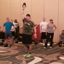 Todd Durkin balancing a kettleball during bootcamp